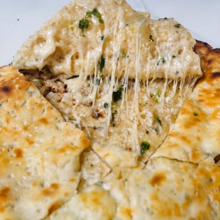 Savor our freshly baked naan